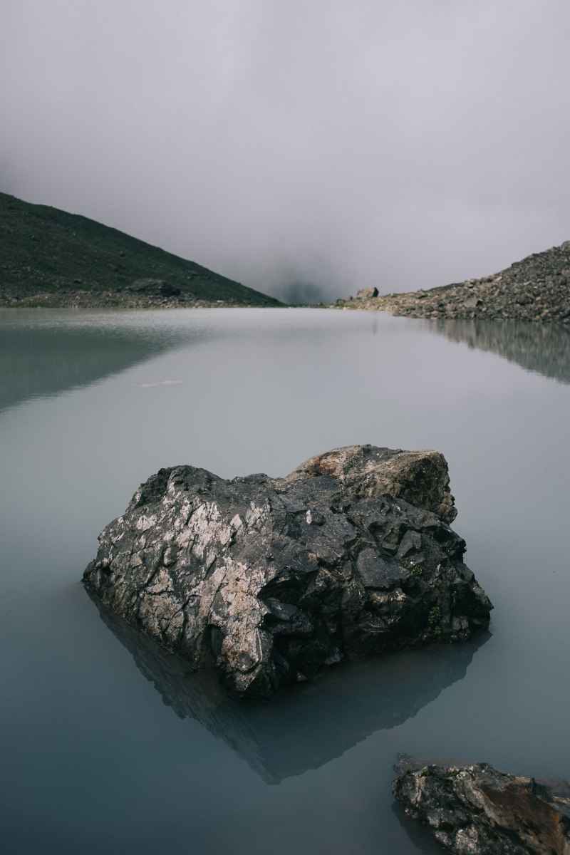 Rock in glacial lake near Roshka