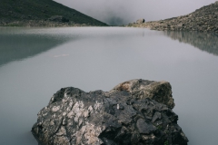 Rock in glacial lake near Roshka