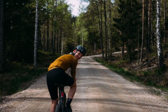 Robin Patijn from Farawayistan gravel cycling on a gravel road in Dalsland