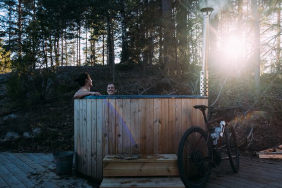 A wood-fired hot tub with the glass cabin in Dalsland, West Sweden