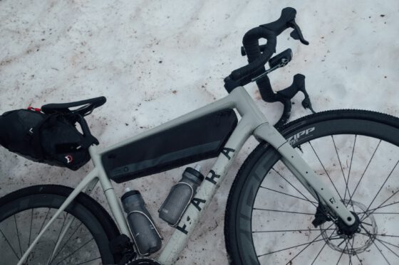 Fara Gravel bike laying in the snow on the Rallarvegen